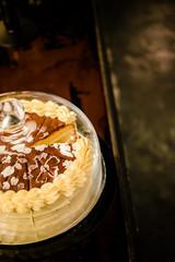 Cake under glass bell dome. Cake stand, dessert buffet, storage