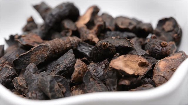 Chinese herb medicine of Cyperi Rhizoma or Nutgrass Galingale Rhizome rotating close up