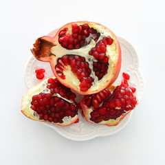 Rosh hashanah (jewish New Year holiday) concept. Pomegranate raditional symbol. Flat lay.