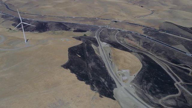 Aerial footage of a 650 acre fire started in the Altamont hills between Tracy and Livermore in California.