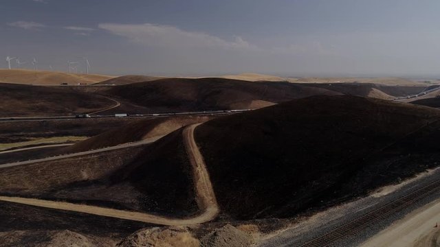 Aerial footage of a 650 acre fire started in the Altamont hills between Tracy and Livermore in California.
