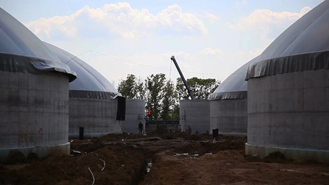 Production of biogas. Biogas plant. Construction of production facilities for processing chicken litter in biogas. Alternative Energy with Bio Technology