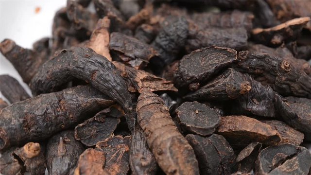 Chinese herb medicine of Cyperi Rhizoma or Nutgrass Galingale Rhizome rotating close up