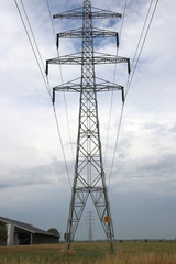Electricy lines with towers to carry in Overijssel, The Netherlands.