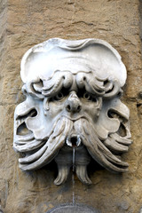 An ornamental fountain head