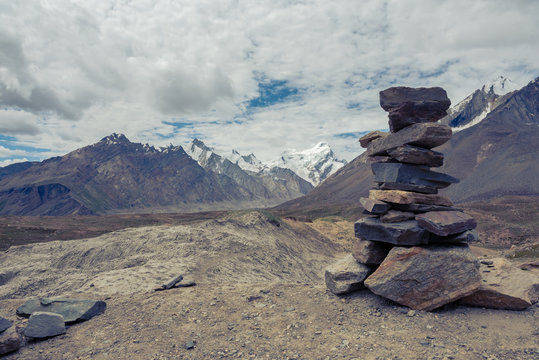 Pile stacked of zen stones or rocks on beautiful Landscape of Padum valley in Karsha village at Zanskar, Ladakh, India.