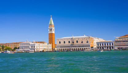 Fototapeta na wymiar Panorama of historic Venice in sunny day from the lagoon in Venice, Italy