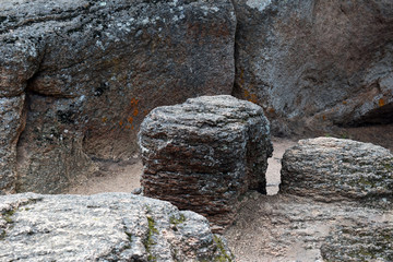 Ancient ruins in the forest.  Big rocks in the mountains. Krasnoyarsk pillars. Dolmens.