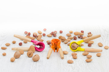 Stylish modern colorful nut crackers with various nuts