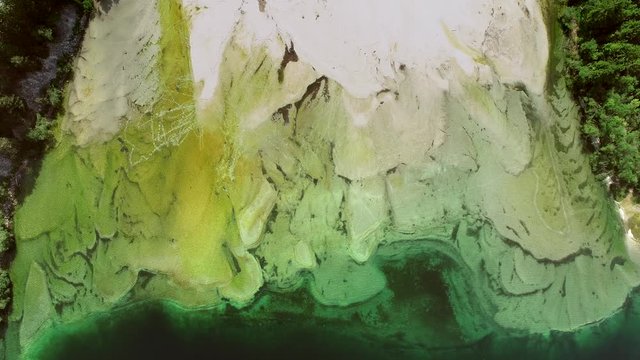 
Aerial view of the green and transparent water in Lago del Predil, tally.