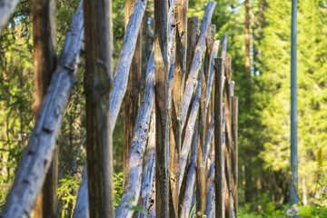 Fence from wooden rods.