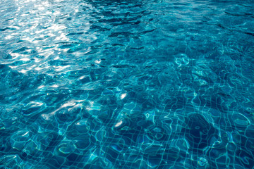 Surface of swimming pool water background