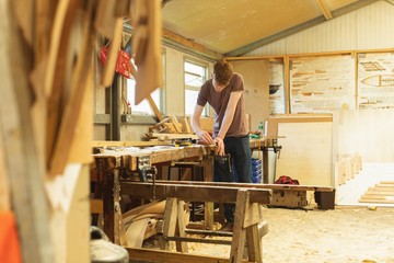Male carpenter working in workshop