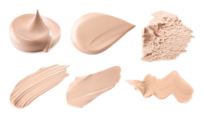 Makeup product smears on white background. Color set of foundation