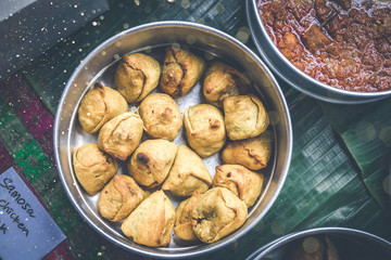 Delicious samosas on table, top view. Indian food.