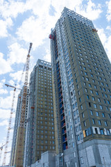 Fototapeta na wymiar Construction of residential buildings 