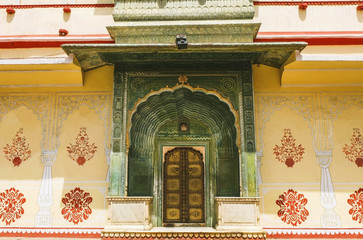 View of The Leheriya gate( the waves gate) in the City Palace,  Jaipur Rajasthan,India. The gate is on the northwest side, there is represent the spring season decorated with green colour.