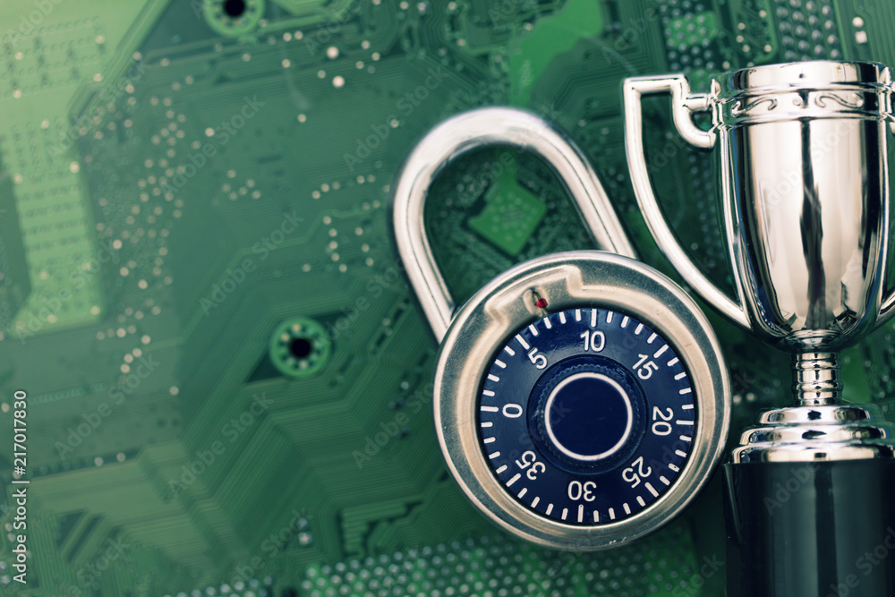 Poster data security expert. padlock and trophy on a computer electronic circuit board.
