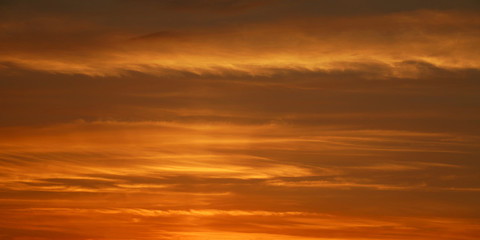 Naklejka na ściany i meble Dramatic colorful sunset sky background, beauty in nature