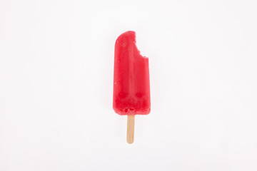 Tasty and refreshing popsicles on white background