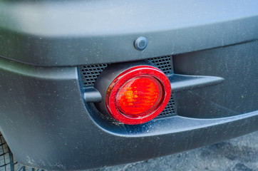 Vehicle tail lights black rear turn signal in the street