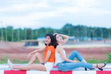 Portrait of two beautiful asian women,Lifestyle of modern girl,Image of young happy female,Dear friends are together on weekends to relax.