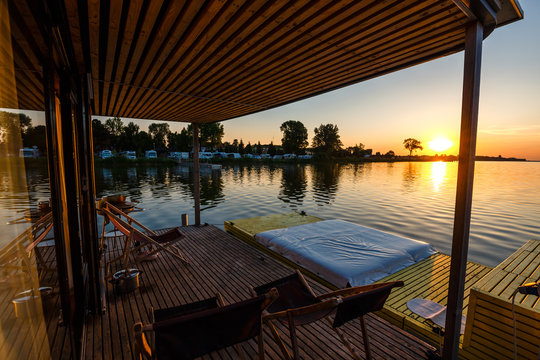 floating cottage on the lake at sunrise