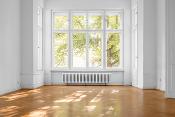 window in empty room, old apartment building with  parquet floor  - obrazy, fototapety, plakaty