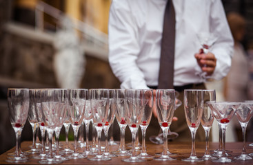 Champagne glasses on gold background. Party and holiday celebration concept