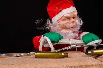Santa climbing the wall, a concept on immigration
