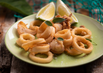 Golden fried calamari squid on a plate