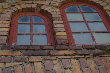 Arched windows in an old stone building