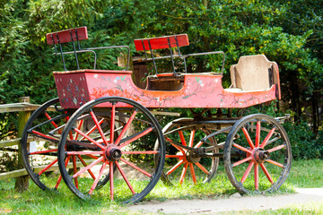 Fototapeta na wymiar Old red carriage