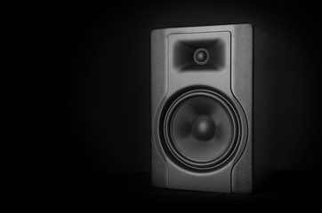 professional audio speaker on a black background