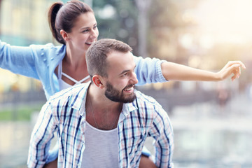 Happy couple dating in the city