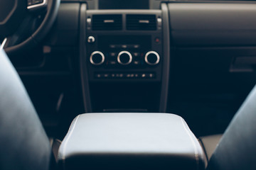 Car armrest in leather upholstery