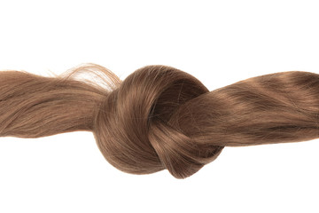 Knot of brown hair, isolated on white