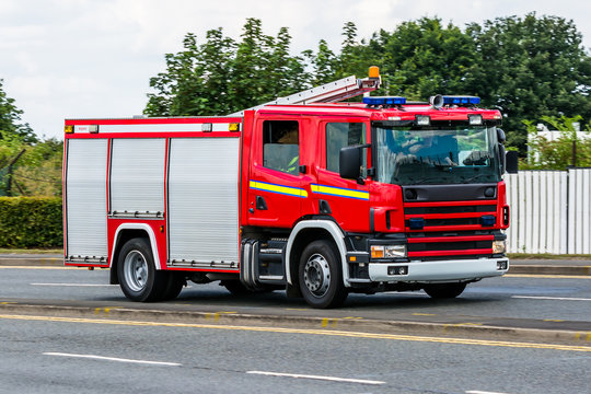 Fire fighting engine vehicle responding and drive to the fire