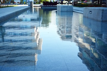 Modern apartment buildings on a sunny day with a blue sky. Facade of a modern apartment building