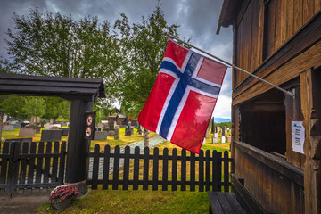 Hedalen - July 28, 2018: Flag of Norway in the wonderful Hedalen Stave Church, Norway