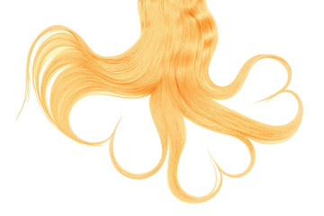 Blond hair in shape of heart isolated on a white background