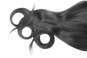 Swirled black hair on white background