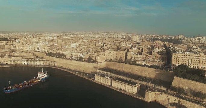 Aerial Shot over a City between two seas