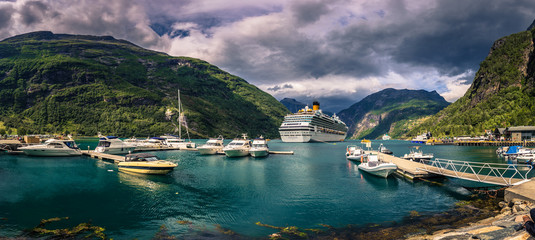 Geiranger - July 30, 2018: Cruise boat in the UNESCO town of Geiranger, Norway