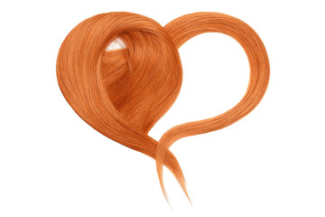 Red hair in shape of heart on white background