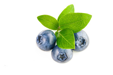 Isolated blueberry. Fresh blueberries with leaves isolated on white background