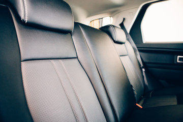 Car seat in leather upholstery