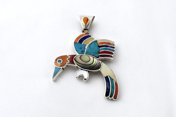 Modern jewelry incorporating Inca designs