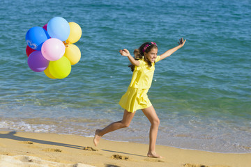 Happy Girl Running on Beach
