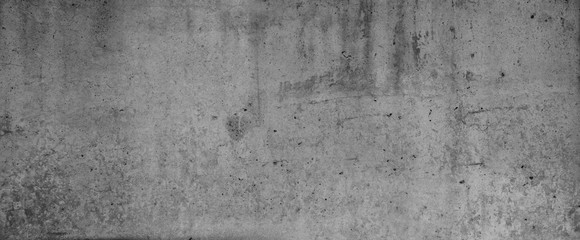 Grey textured concrete cement stone wall wide background